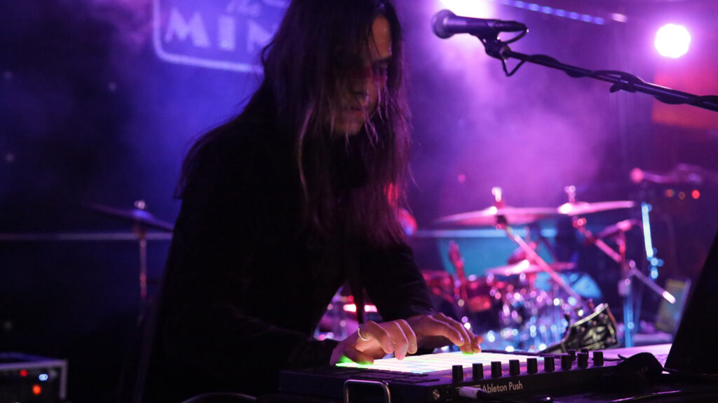 Giorg performing at the Mint